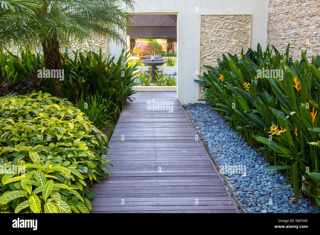 Beautifully manicured tropical garden design at the Ocean Wing of the Rasa Ria Hotel in Sabah Borneo Stock Photo
