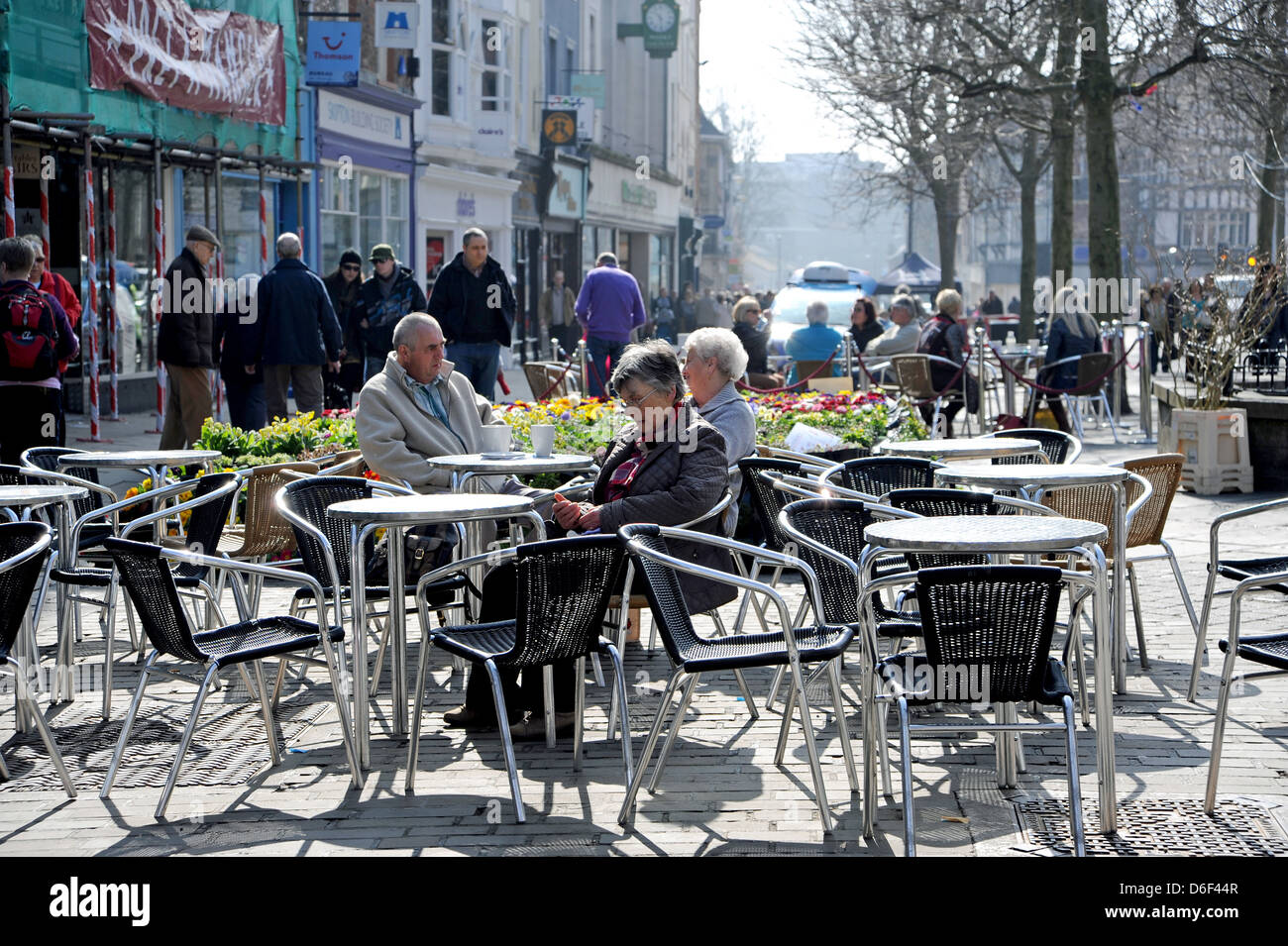 People enjoy a coffee outside in square York Yorkshire UK Stock Photo