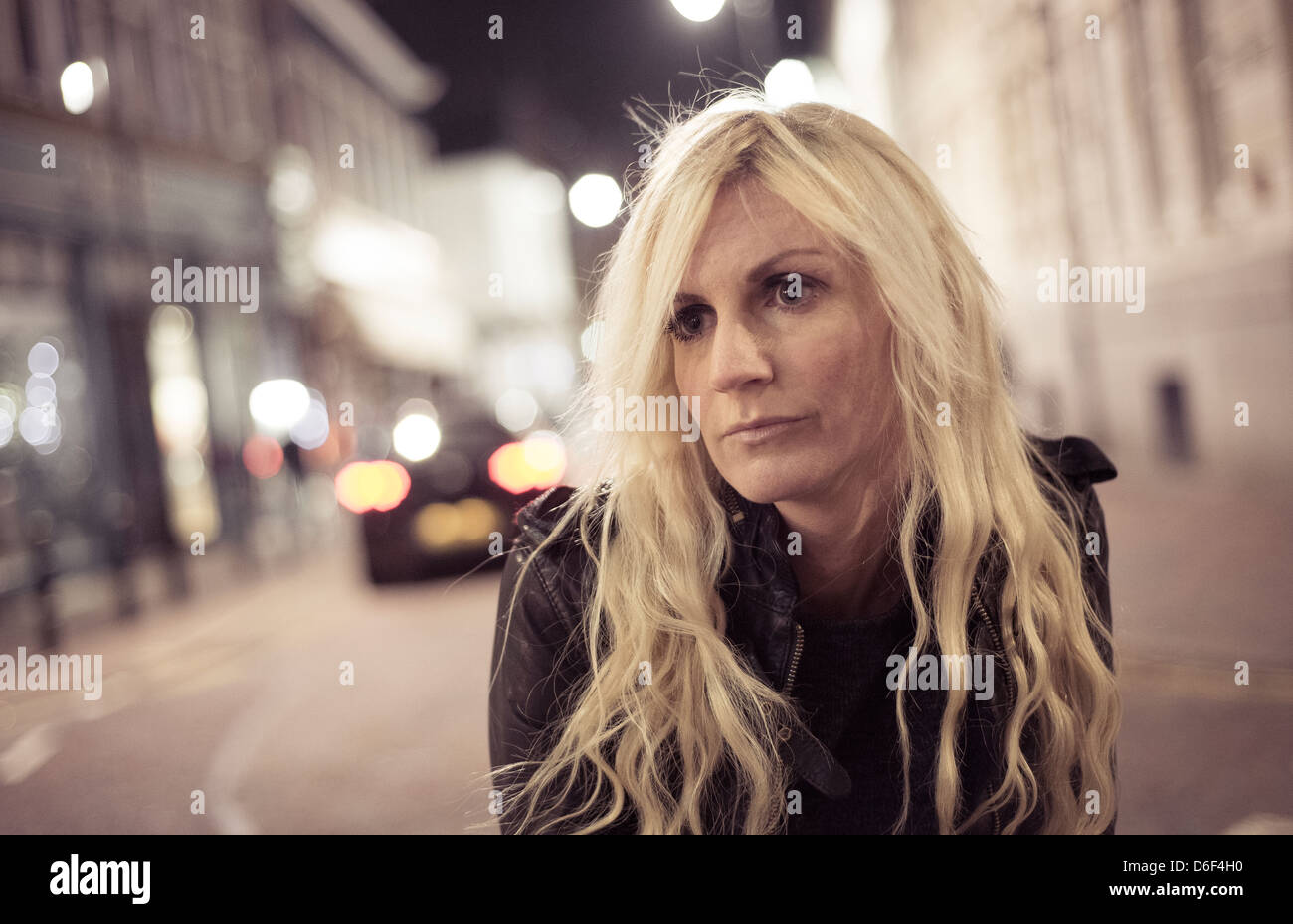 Woman lone street night hi-res stock photography and images - Alamy