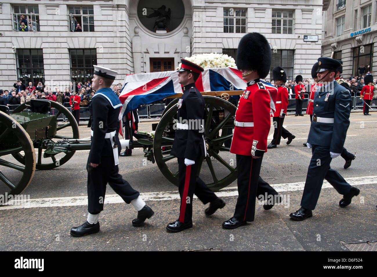 London, UK. 17th April, 2013. The coffin of former British Prime Minister, Margaret Thatcher is drawn along Fleet St on a First World War gun carriage towards her funeral at St Paul's Cathedral, London.  Photography by Jason Bye   /Alamy Live News Stock Photo