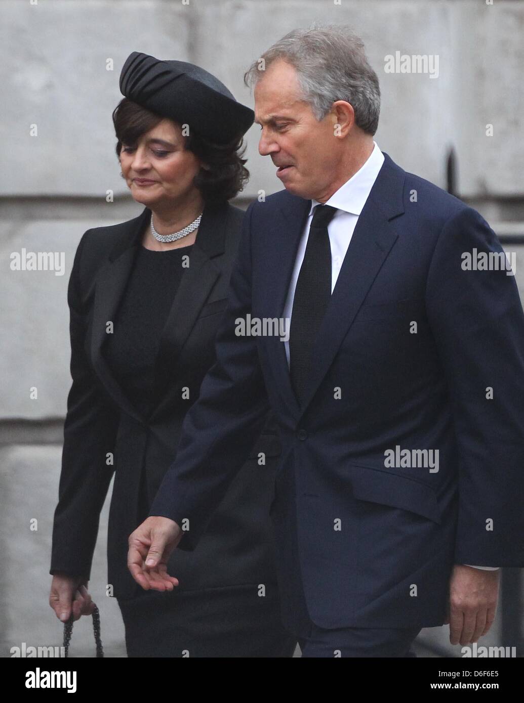 London, UK. 17th April, 2013. Tony Blair and his wife Cherie arrive at Margaret Thatcher's funeral at St Paul's Cathedral in Central London. Dignitaries from around the world joined Queen Elizabeth II and Prince Philip, Duke of Edinburgh as the United Kingdom pays tribute to former Prime Minister Thatcher Baroness Thatcher during a Ceremonial funeral with military honours at St Paul's Cathedral. Lady Thatcher, who died last week, was the first British female Prime Minister and served from 1979 to 1990. Stock Photo