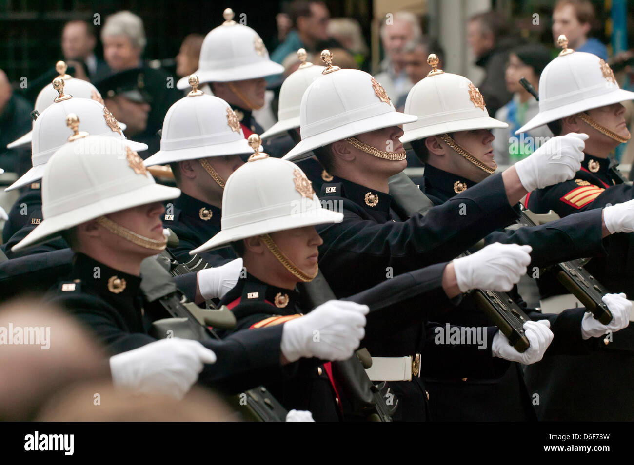 Guardsmen of the Royal Marine Corps march down Fleet Street,  after escorting Baroness Thatcher's coffin to St Pauls Cathedral. Stock Photo