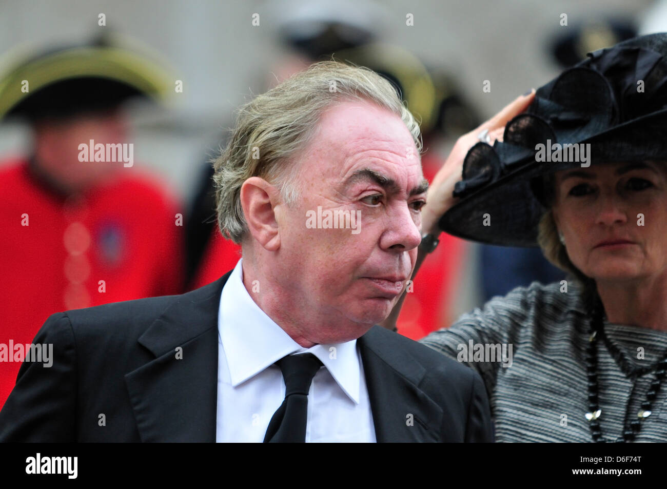 Lord Andrew Lloyd Webber with Lady Lloyd Webber (Sarah Hugill) at Margaret Thatcher's funeral at St Paul's Cathedral. London, UK. 17th April, 2013. Stock Photo