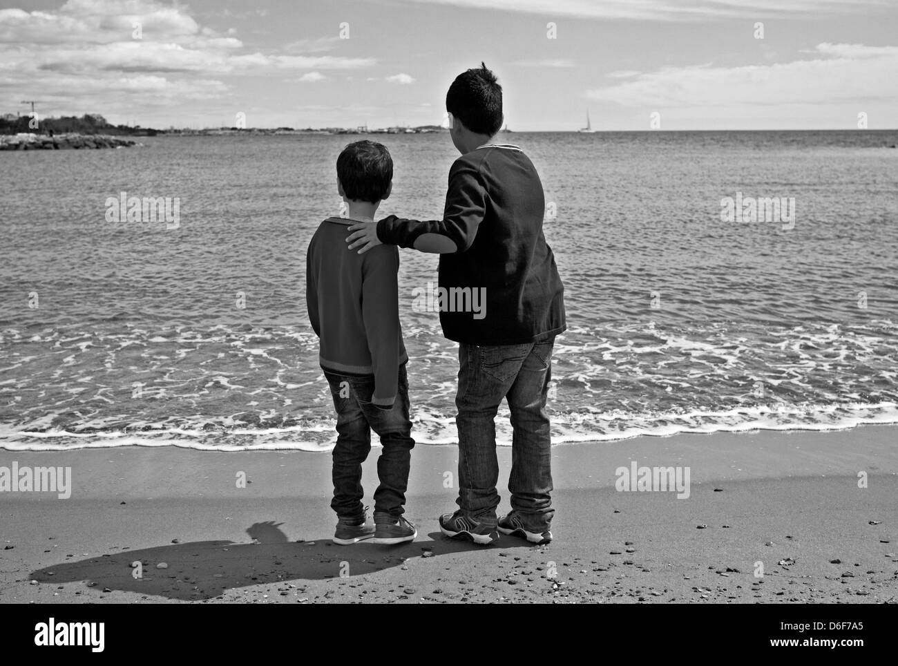 -Fellowship- Kids in front the beach. Mediterranean Sea (Spain). Stock Photo