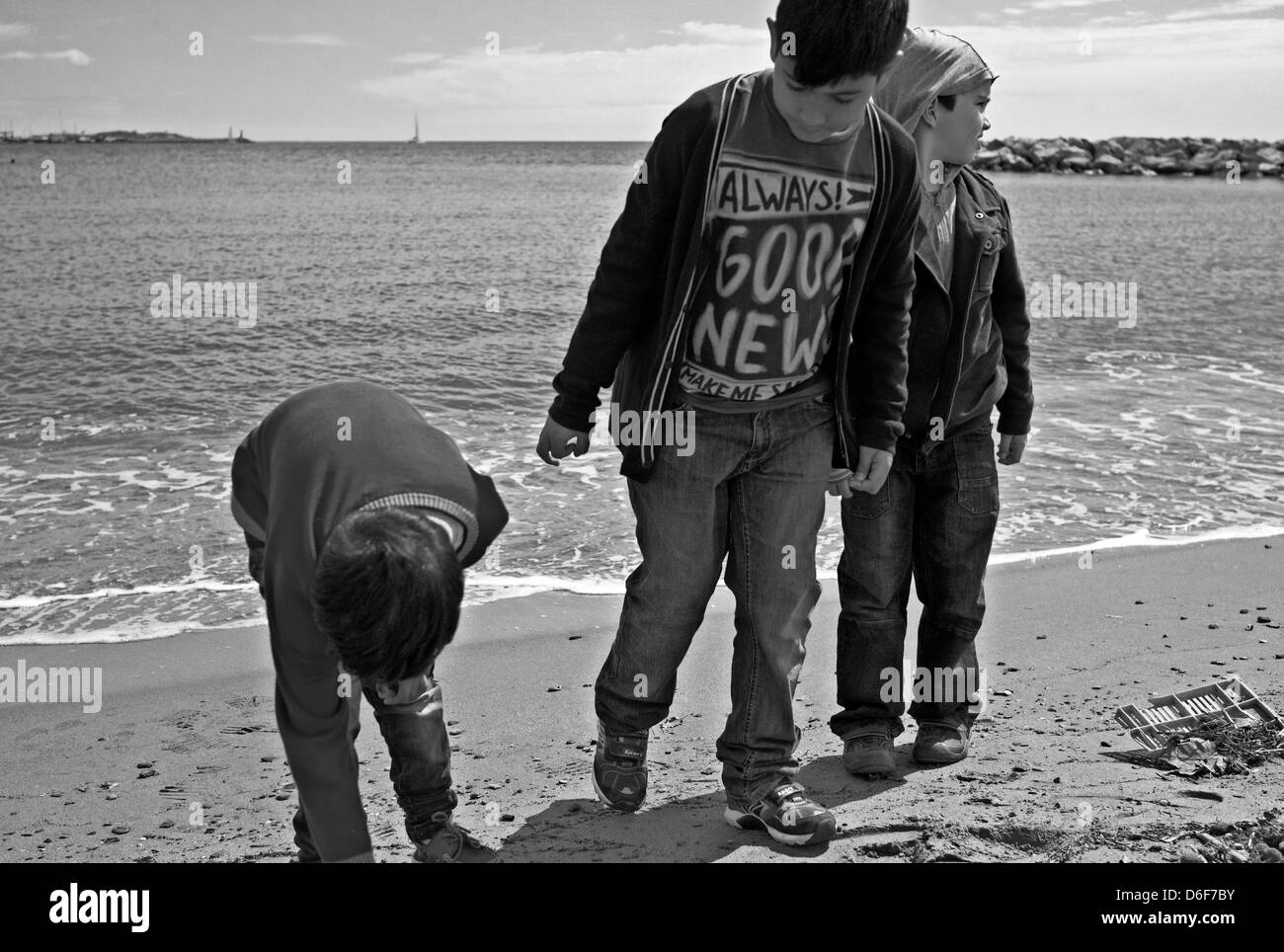 -Fellowship- Kids playing in Outdoors. Mediterranean Sea (Spain). Stock Photo