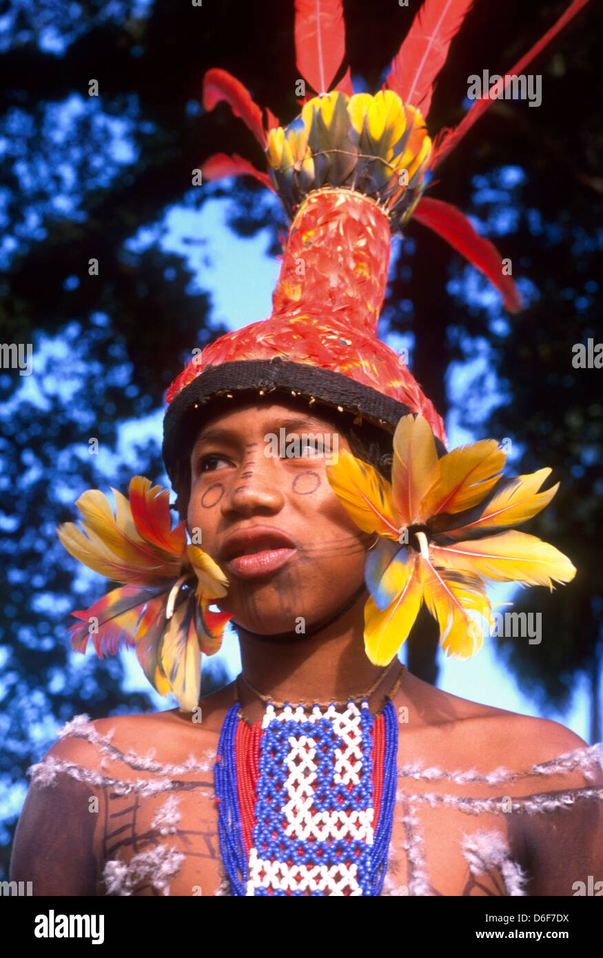 Portrait of Karaja indigenous people wearing adornments and headdress, Ilha do Bananal ( Bananal Island ), Mid-west Brazil. Stock Photo