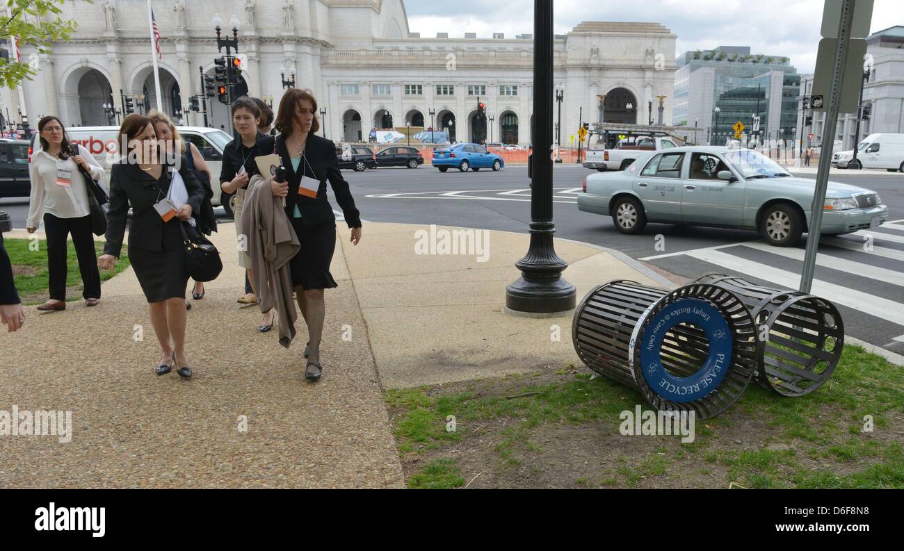 Washington, DC, USA. 17th April, 2013. Overturned trash cans between