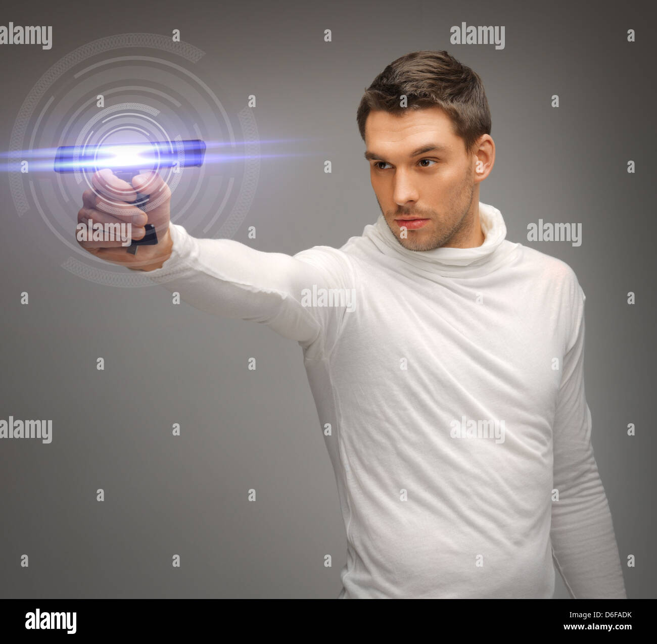 man with sci fi weapon Stock Photo