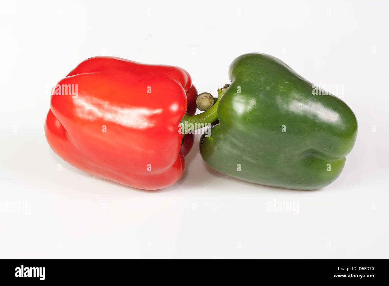 Two peppers isolated on white background Stock Photo - Alamy