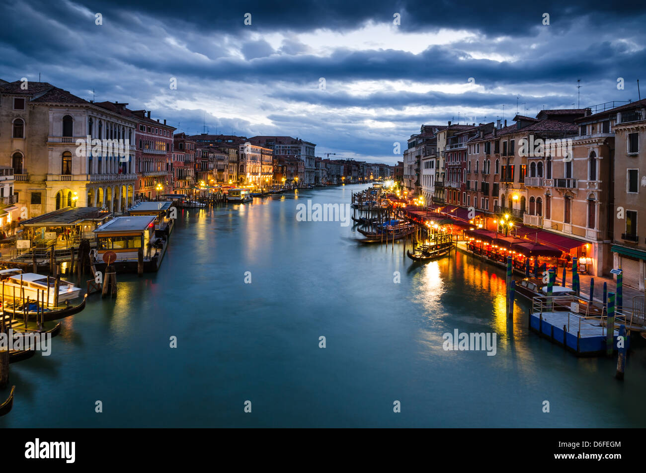 View of Grand Canal in the night, seen from Rialto Bridge, touristic place of Venice laguna. Stock Photo