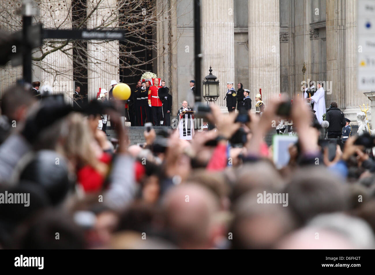 London, UK. 17th April 2013. The Funeral of Baroness Margaret Thatcher. The coffin of Baroness Margaret Thatcher leaves St. Paul's Cathedral as the crowds look on. The Funeral service takes place in St. Paul's Cathedral, London. Pic: Paul Marriott Photography/Alamy Live News Stock Photo