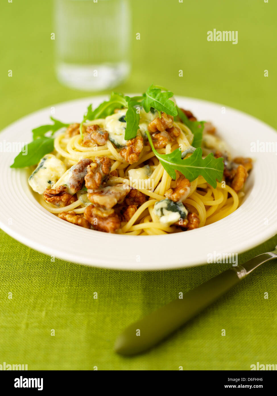 Spaghetti with dolcelatte and rocket Stock Photo
