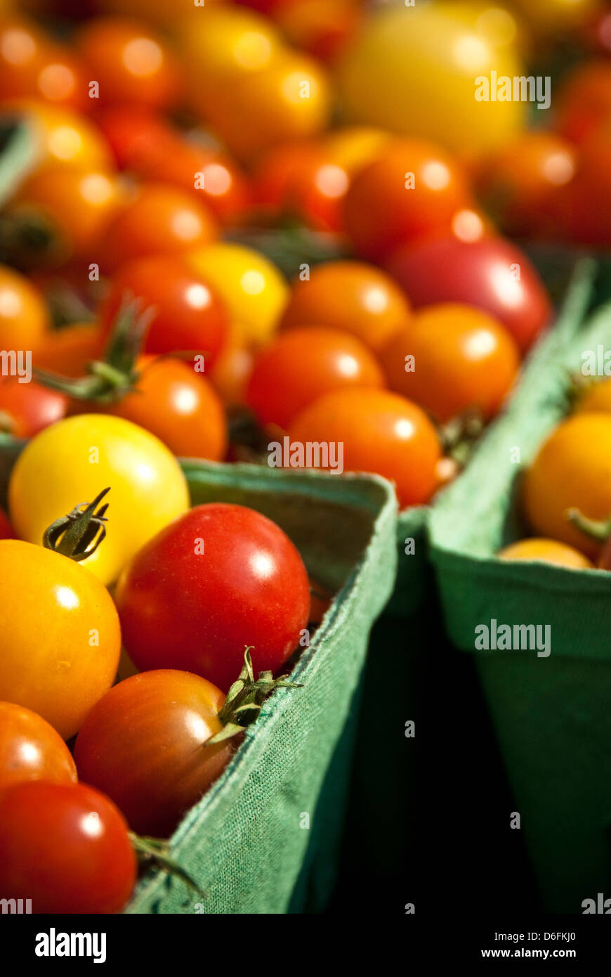 Punnets of ripe heirloom cherry tomatoes at the farmers' market Stock ...