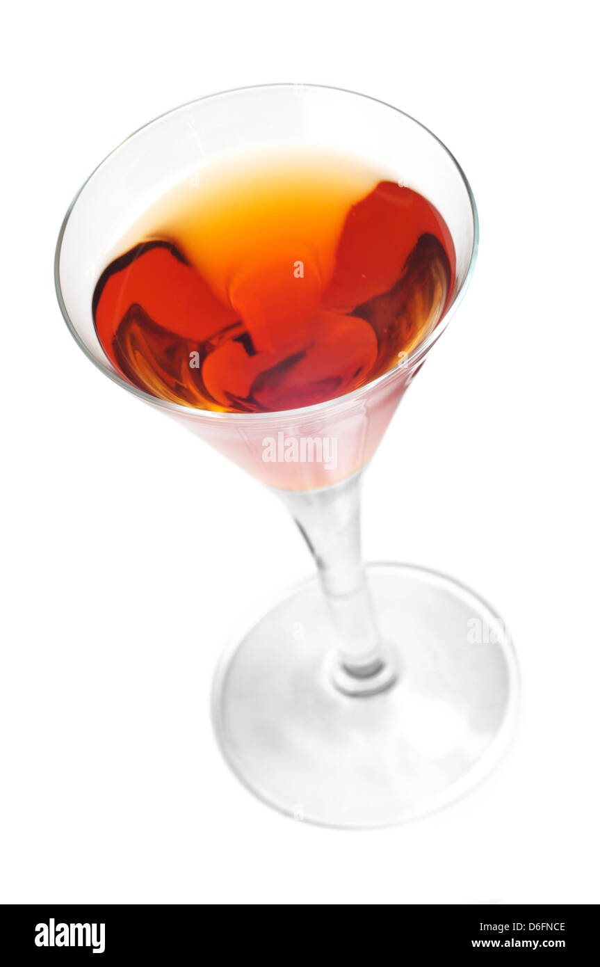 Glass of Amaretto liqueur on white background Stock Photo Alamy