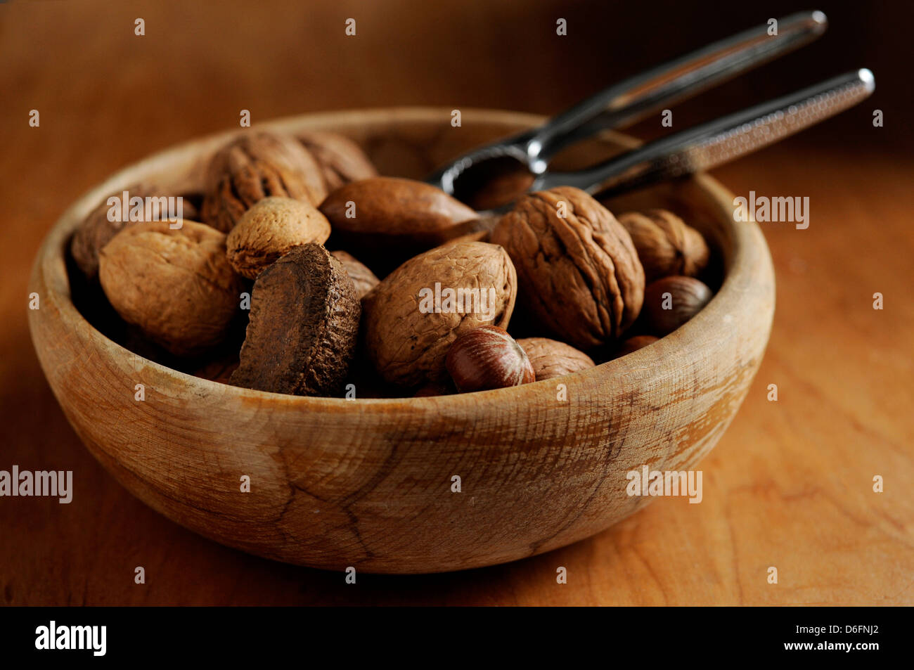 Mixed nuts in bowl Stock Photo
