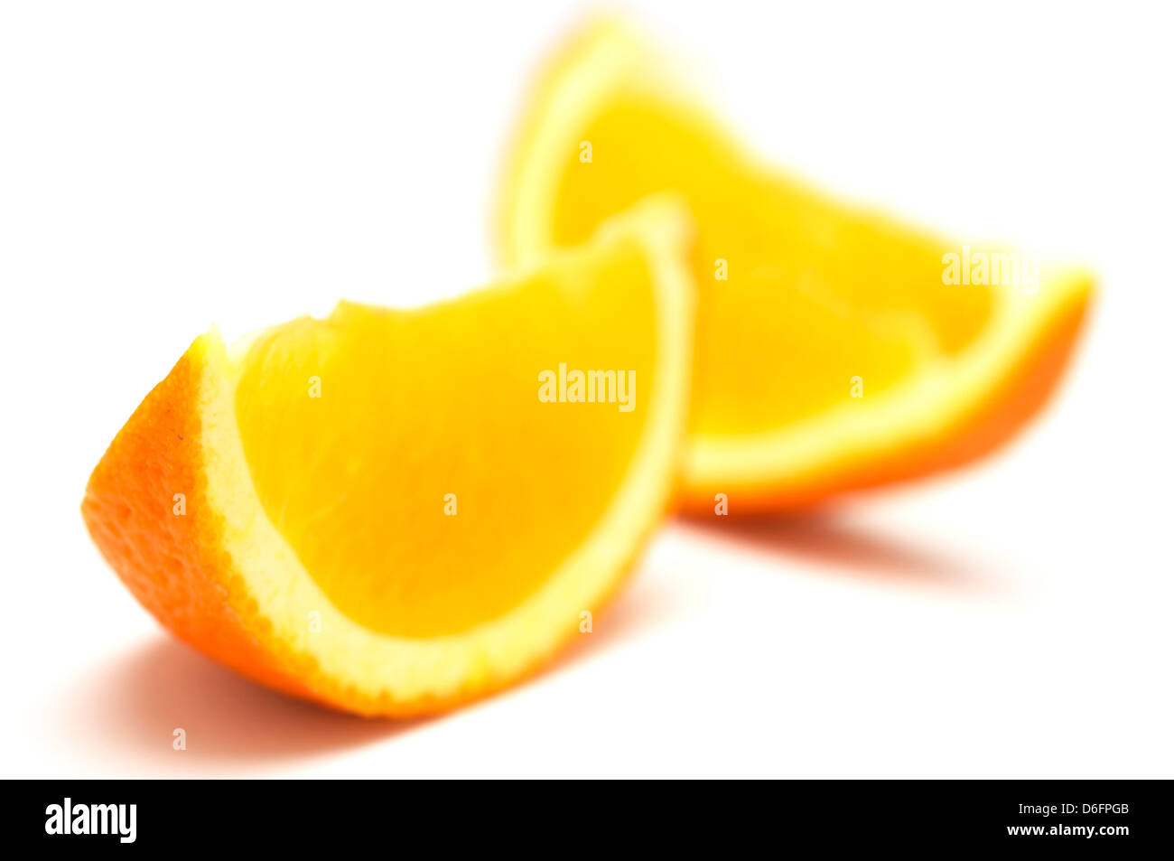 Orange segments on white background Stock Photo Alamy