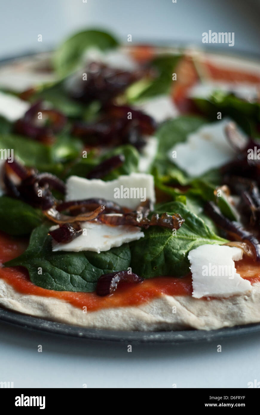 Goats Cheese ,spinach and onion Pizza Stock Photo Alamy
