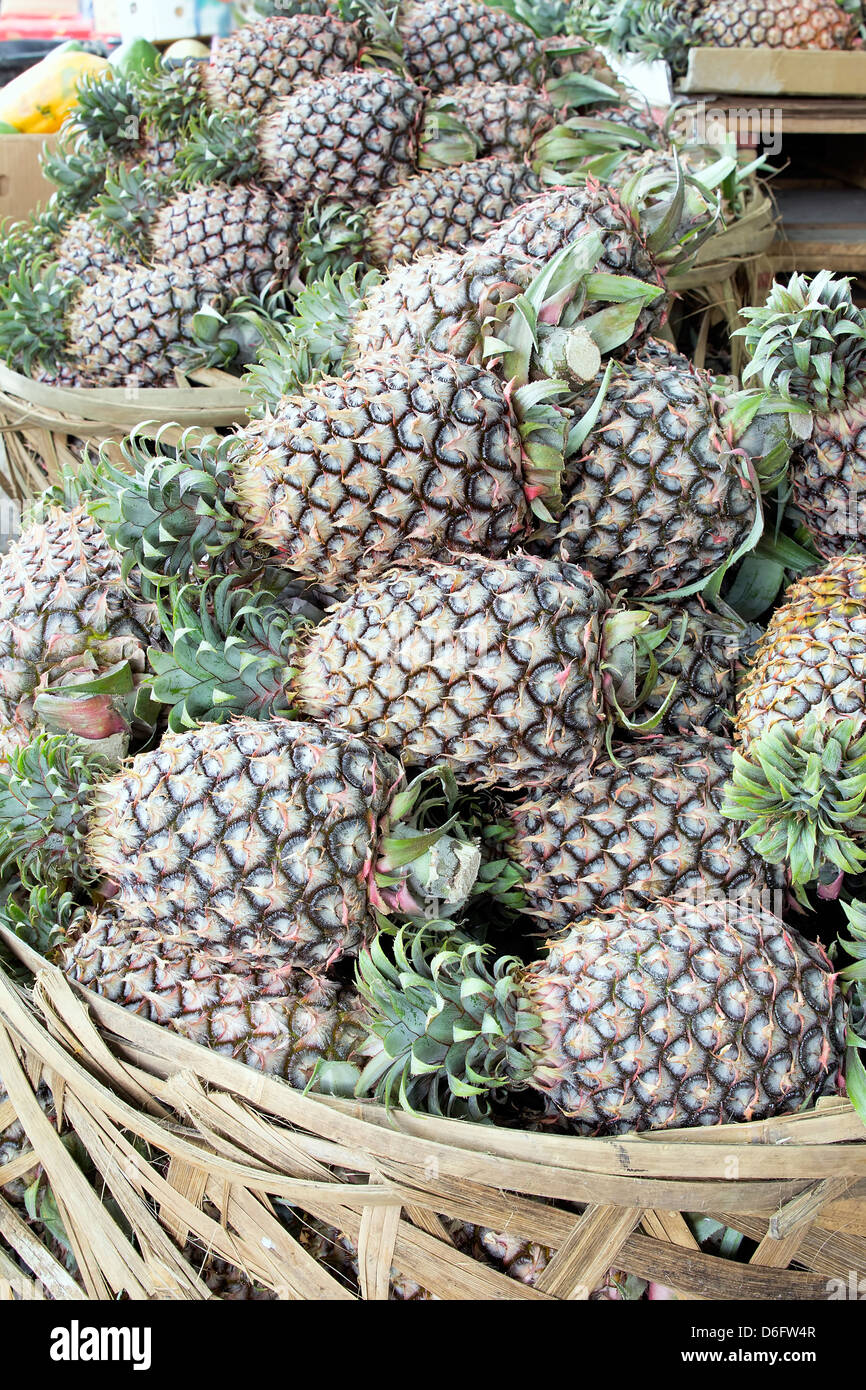 Pineapples Piled up in Basket at Fruits and Vegetables Market in