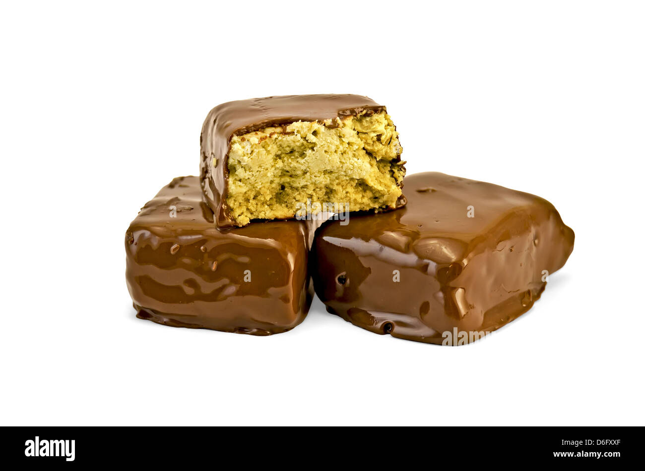 Two Whole And One Half Of Halva Glazed With Chocolate Isolated On White