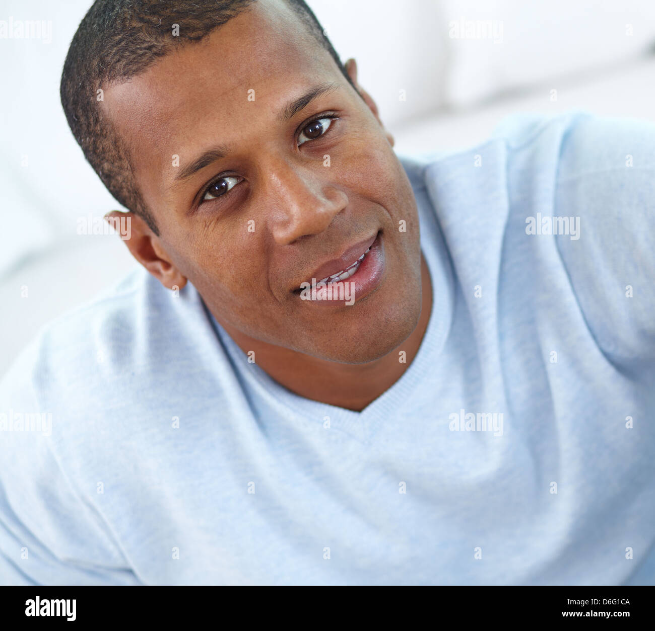 Image of young African man looking at camera with smile Stock Photo - Alamy