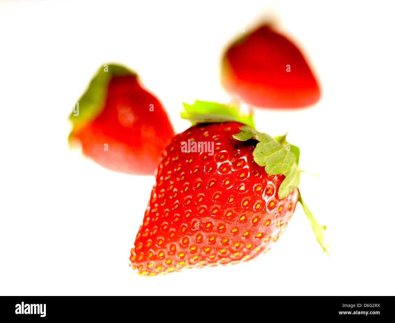 Three whole strawberries hi-res stock photography and images - Alamy