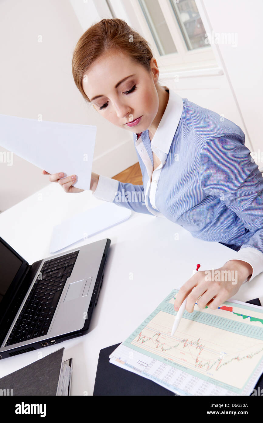 young successful business woman working on computer in office Stock ...
