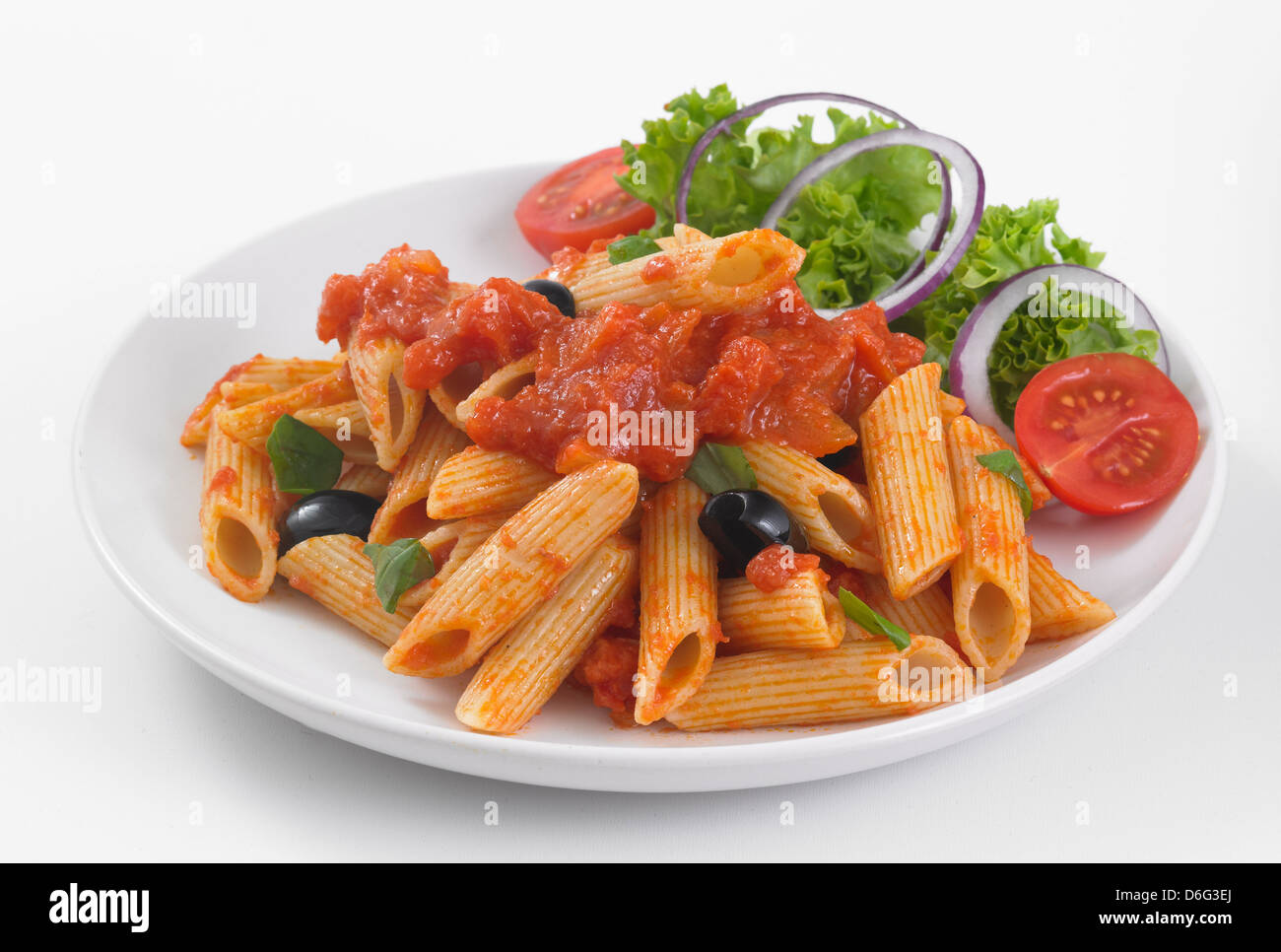 Penne  with tomato sauce and rocket Stock Photo