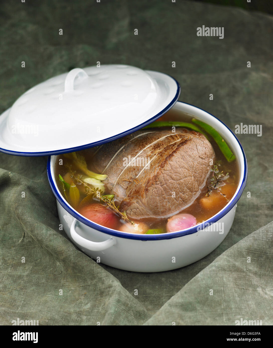 Beef joint with vegetables cooking in pot Stock Photo Alamy