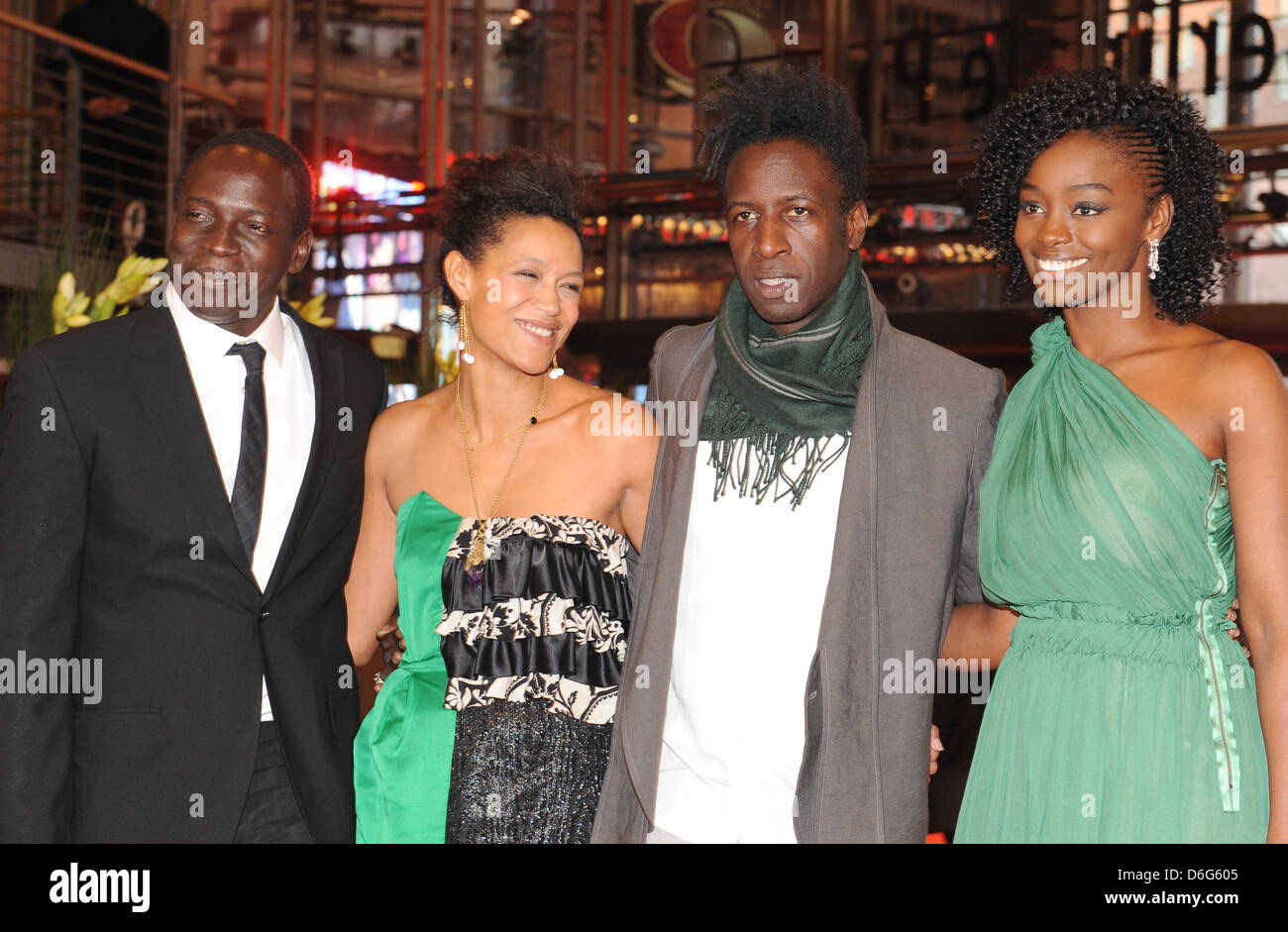 Actor Djolof M'bengue, actress Anisia Uzeyman (L-R), actor Saul Williams and actress Aissa Maiga arrive for the premiere of the movie 'Tey' (_Aujourd'hui_) during the 62nd Berlin International Film Festival, in Berlin, Germany, 10 February 2012. The movie is presented in competition at the 62nd Berlinale running from 09 to 19 February. Photo: Britta Pedersen dpa Stock Photo