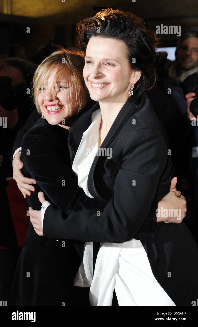 French actress Juliette Binoche (R) and Polish actress Joanna Kulig arrives for the premiere of the movie 'Elles' during the 62nd Berlin International Film Festival, in Berlin, Germany, 10 February 2012. The movie is presented in the section Panorama Special at the 62nd Berlinale running from 09 to 19 February. Photo: Angelika Warmuth dpa Stock Photo