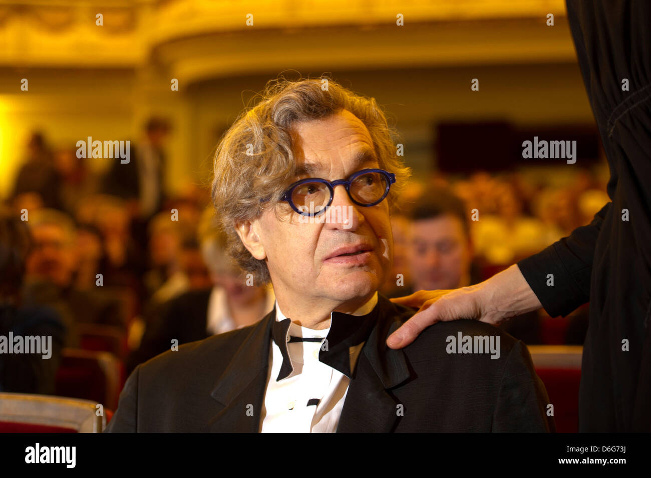 German director Wim Wenders attend the award ceremony of the gives the 3rd international peace prize, the Dresden Prize, to American documentary photographer James Nachtwey at the Semper Opera in Dresden, Germany, 11 February 2012. Photo: ARNO BURGI Stock Photo