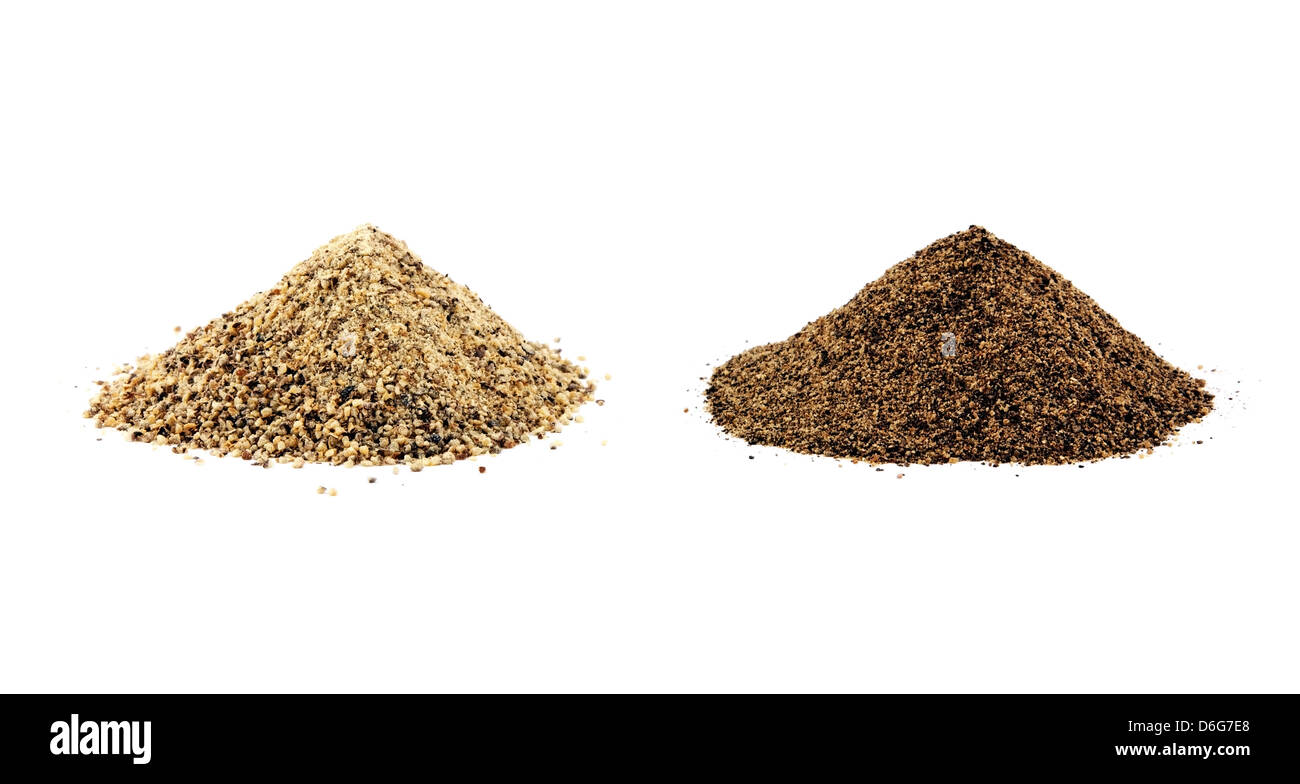 Ground white pepper and black pepper isolated Stock Photo Alamy