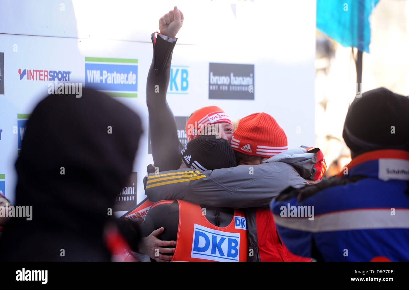 German luger Tatjana Huefner (BACK) celebrates with her teammates after the second run securing her first place medal in the women's single of the World Luge Championships in Altenberg, Germany, 12 February 2012. Photo: THOMAS EISENHUTH Stock Photo