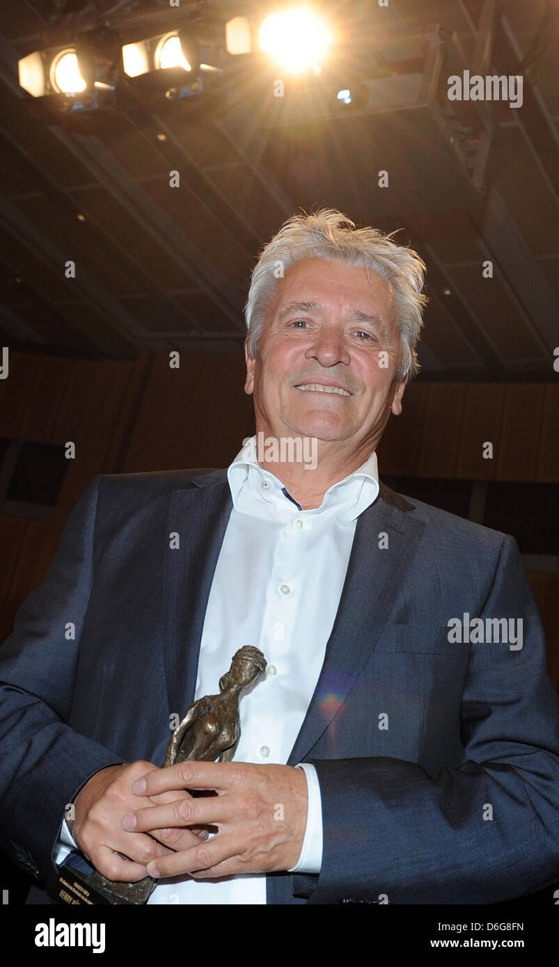 German actor Henry Huebchen receives the Paula award during the ...