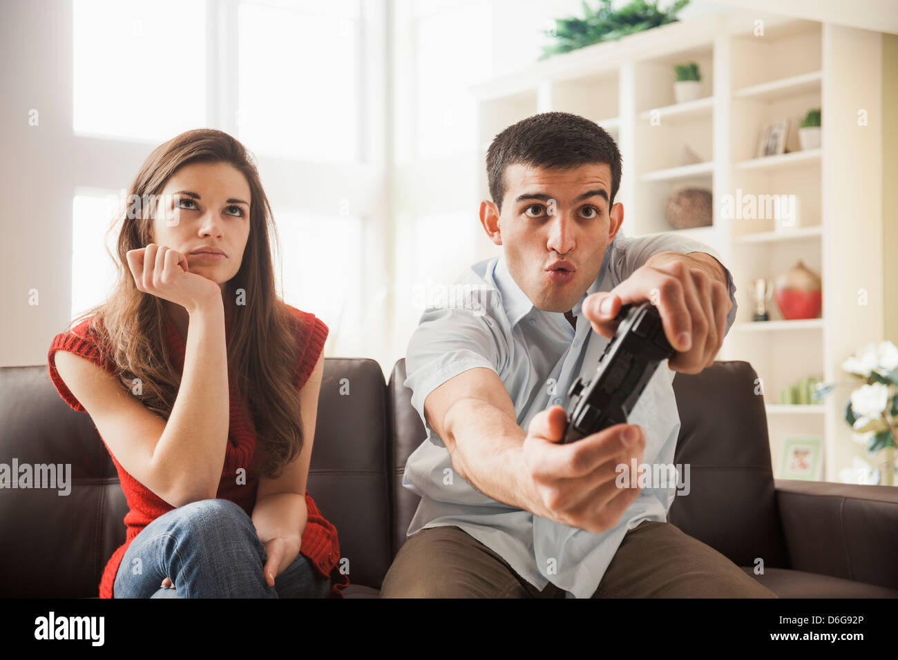 Free Photo  Girlfriend and boyfriend playing video games together at home