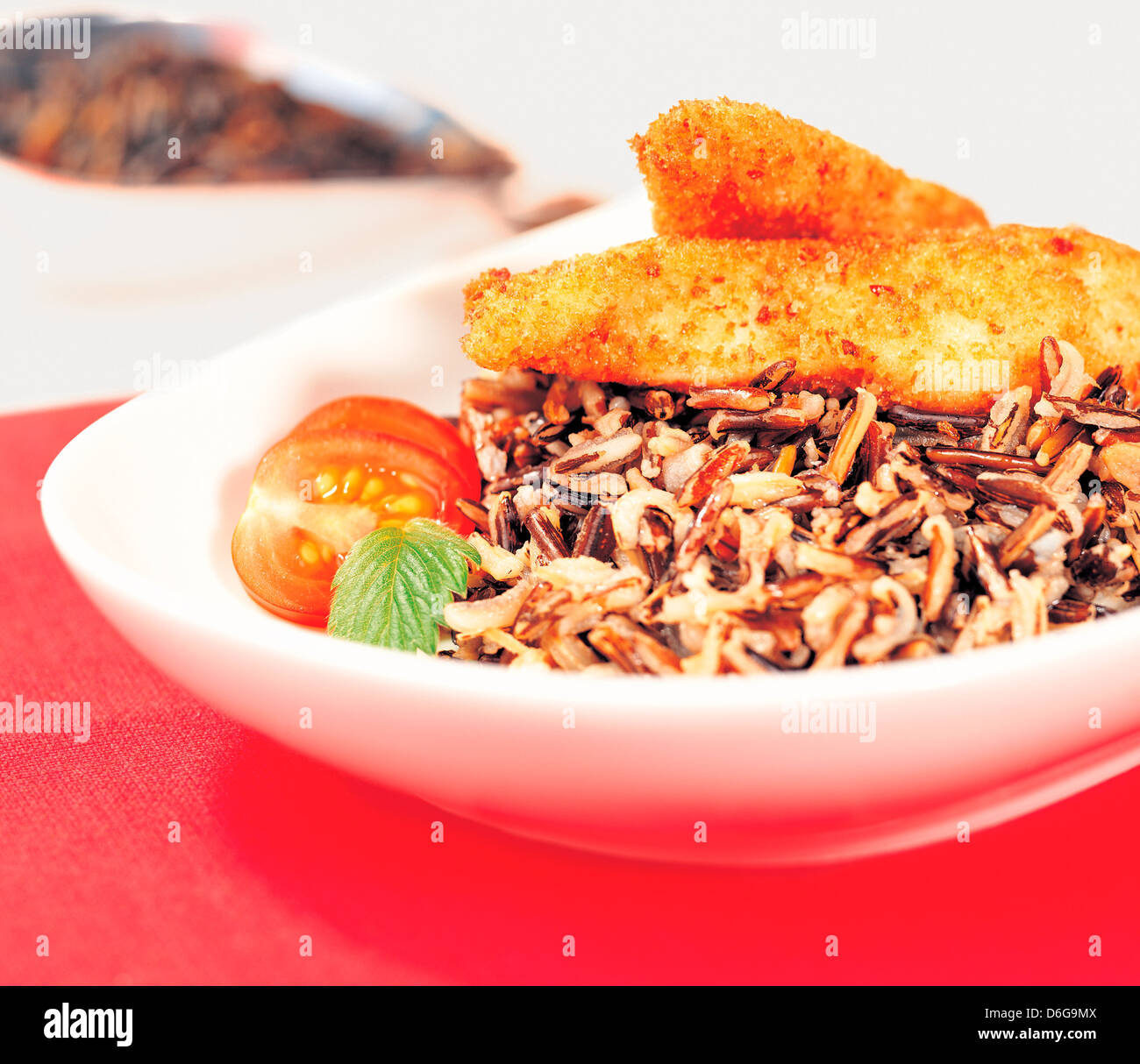 wild rice and breaded chicken Stock Photo Alamy