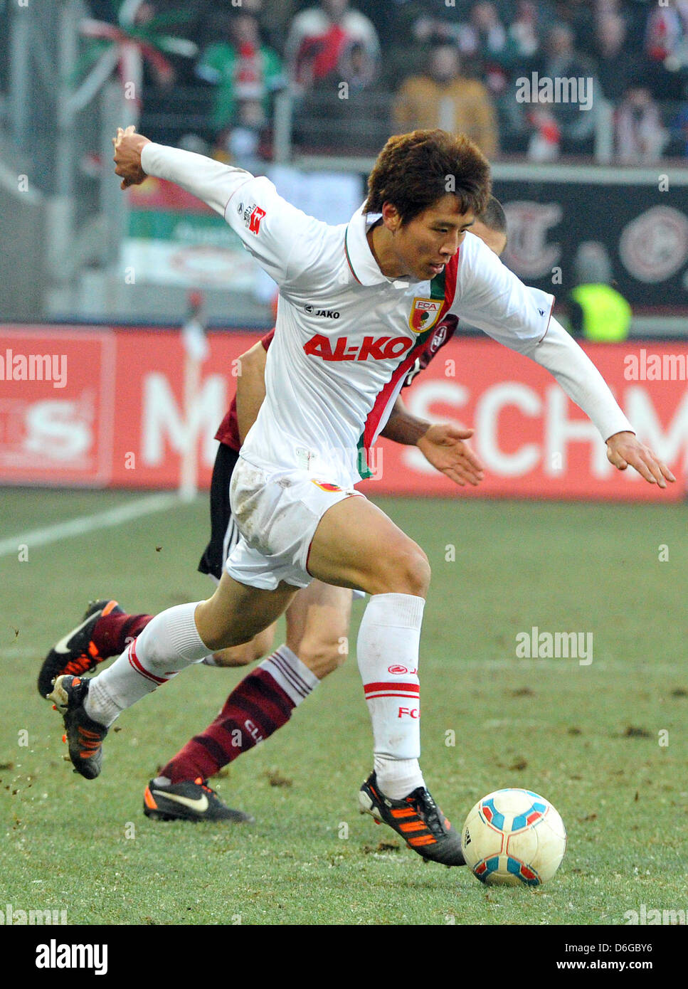 Augsburg's Ja-Cheol Koo plays the ball during the Bundesliga soccer match between FC Augsburg and FC Nuremberg at the SGL Arena in Augsburg, Germany, 12 February 2012. The match ended 0-0 undecided. Photo: Stefan Puchner Stock Photo