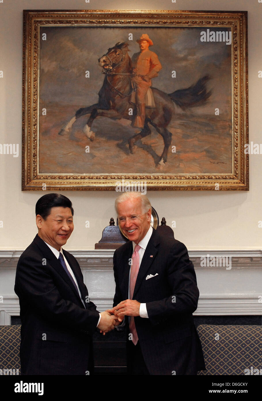 United States Vice President Joe Biden (R) and Vice President Xi Jinping of China hold an expanded bilateral meeting with other U.S. and Chinese officials in the Roosevelt Room at the White House February 14, 2012 in Washington, DC. While in Washington, Vice President Xi will meet with Biden, President Barack Obama and other senior Administration officials to discuss a broad range  Stock Photo