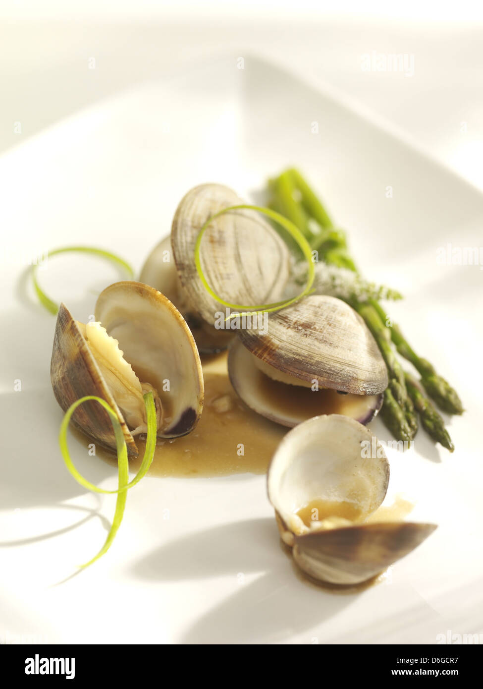 Baby Clams with asparagus Stock Photo Alamy