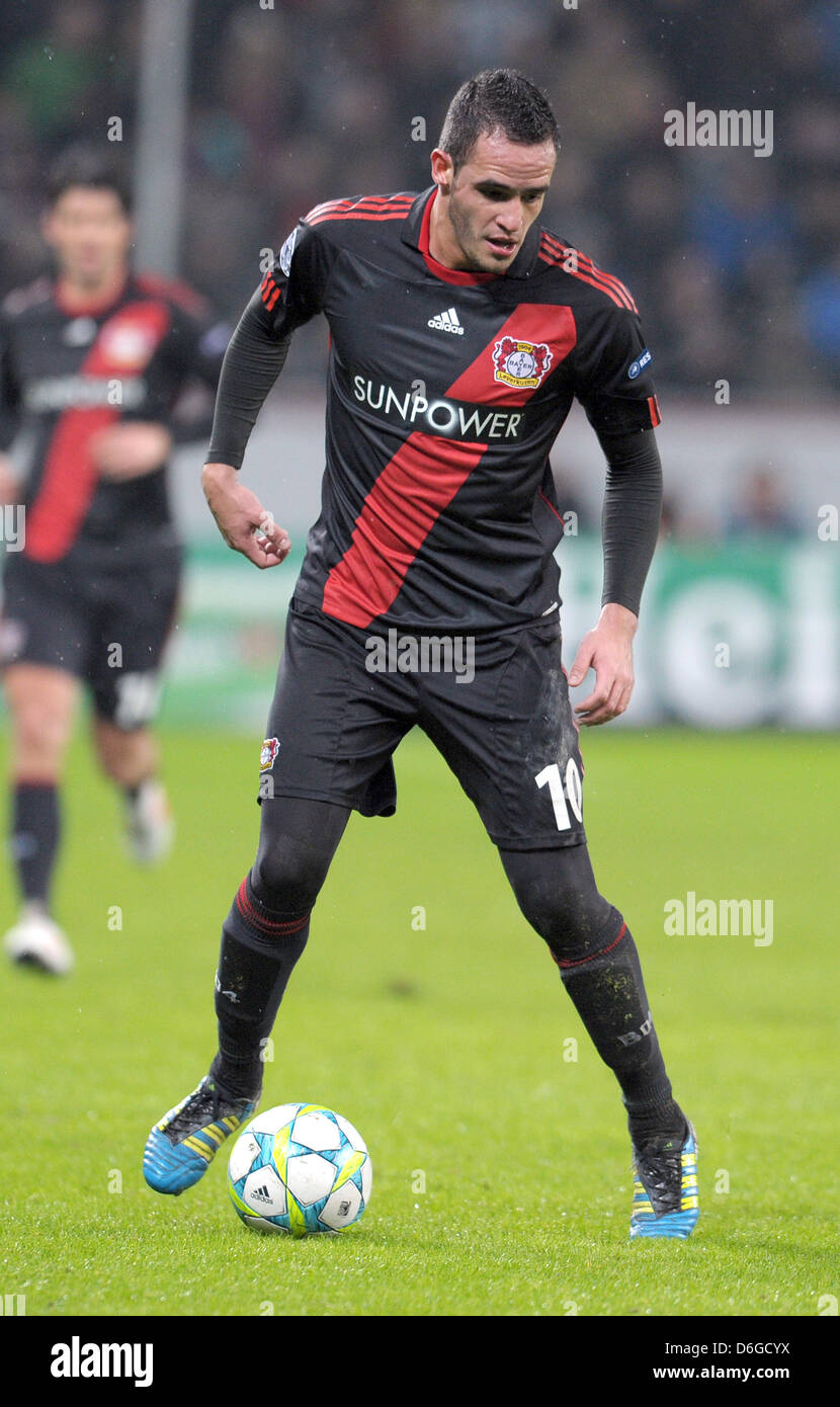 Renato Augusto Of Leverkusen In Action During The Champions League Round Of Sixteen First Leg Soccer Match Between Bayer Leverkusen And Fc Barcelona At The Bayarena In Leverkusen Germany 14 February 2012