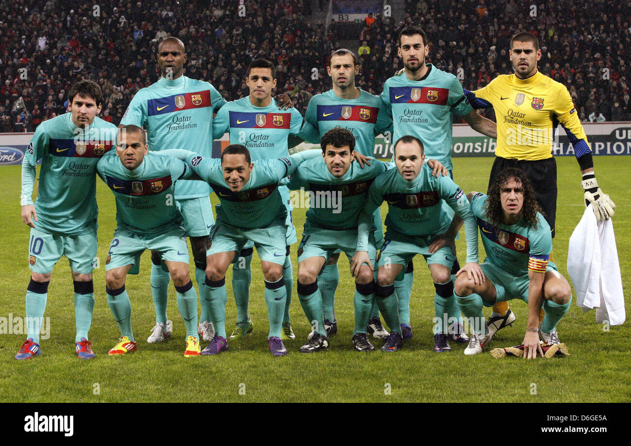 Barcelona's team (back l-r) Eric Abidal, Adriano Correia, Javier Mascherano, Sergio Busquets, Torwart Victor Valdes (front l-r) Lionel Messi, Daniel Alves, Alexis Sanchez, Cesc Fabregas, Andres Iniesta, Carles Puyol during the Champions League round of sixteen first leg soccer match between Bayer Leverkusen and FC Barcelona at the BayArena in Leverkusen, Germany, 14 February 2012.  Stock Photo