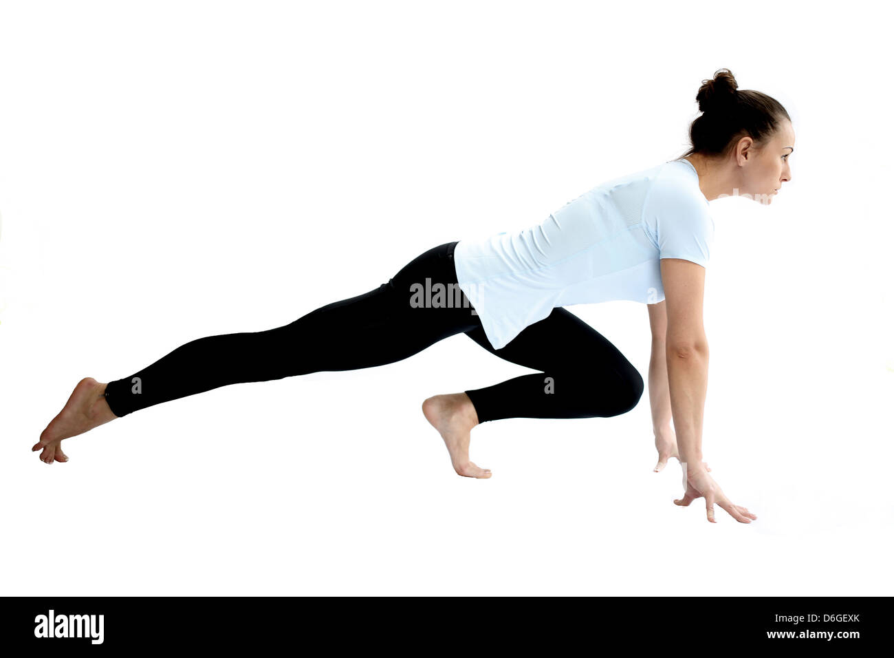 Healthy Fit Young Woman, In Sporty Clothes, Performing Floor Exercises, Isolated Against White Background, Clipping Path Stock Photo