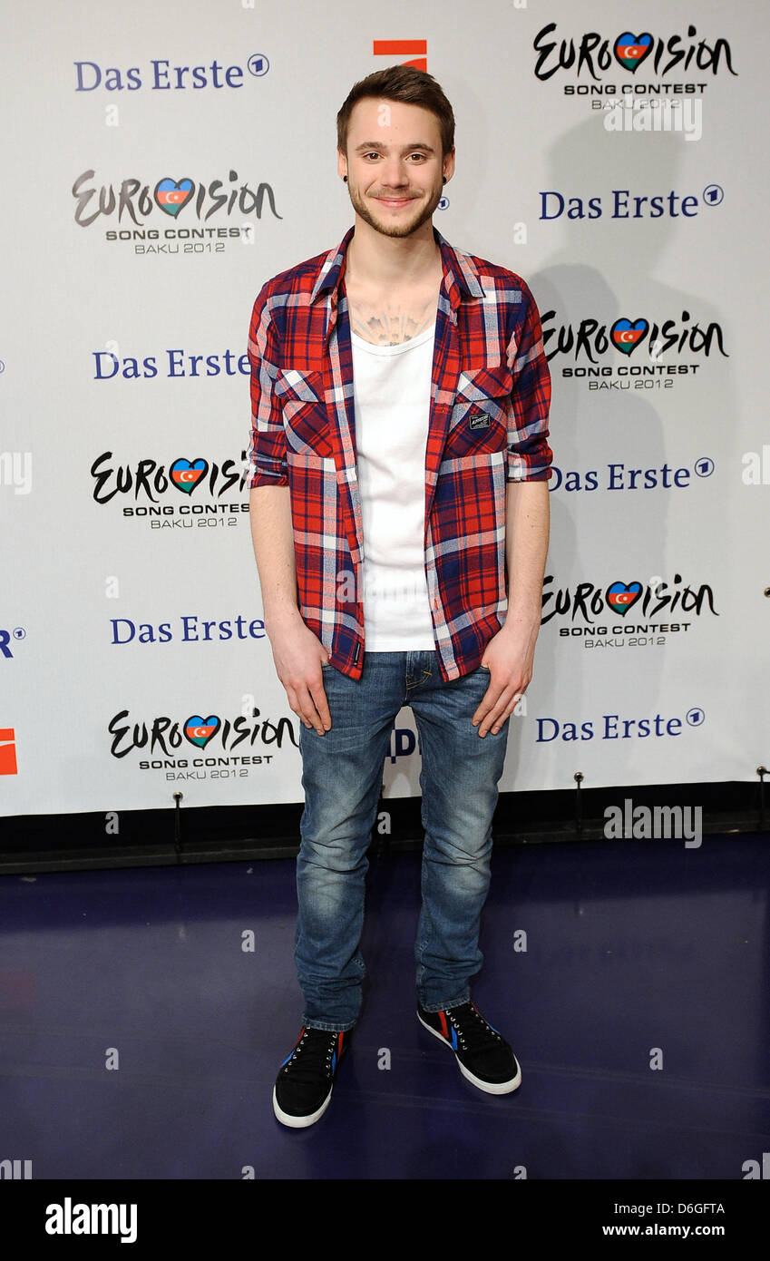 German singer Roman Lob poses for media after winning the final of the German casting show 'Unser Star fuer Baku' ('Our Star for Baku') in Cologne, Germany, 16 February 2012 evening. The casting show was held to choose the German entry for the upcoming Eurovision Song Contest, that will be held in Baku, Azerbaijan, in May 2012. Photo: Henning Kaiser Stock Photo