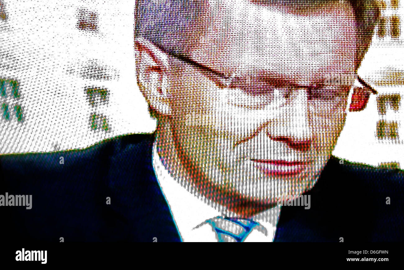 FILE -  A file photo dated 04 January 2012 shows German President Christian Wulff on a TV screen during German Tagesschau news show in Dresden, Germany. The Hanover public prosecutor has late 16 February 2012 requested the immunity of President Christian Wulff to be lifted. The prosecutor says after investigating new documents and the analysis of media reports, there is now an init Stock Photo