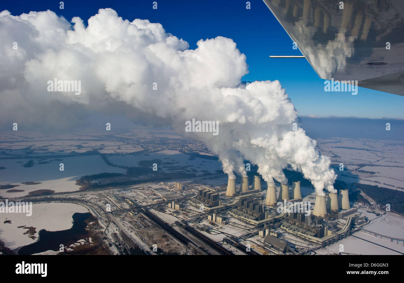 Mighty columns of water vapor rise from the cooling towers of lignite