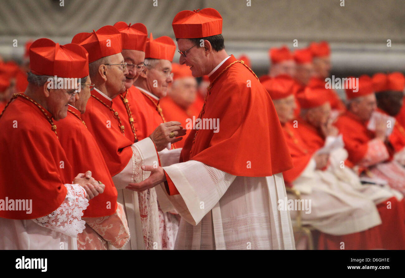 Cardinals congratulate Berlin Archbishop Rainer Maria Woelki (C) after ...