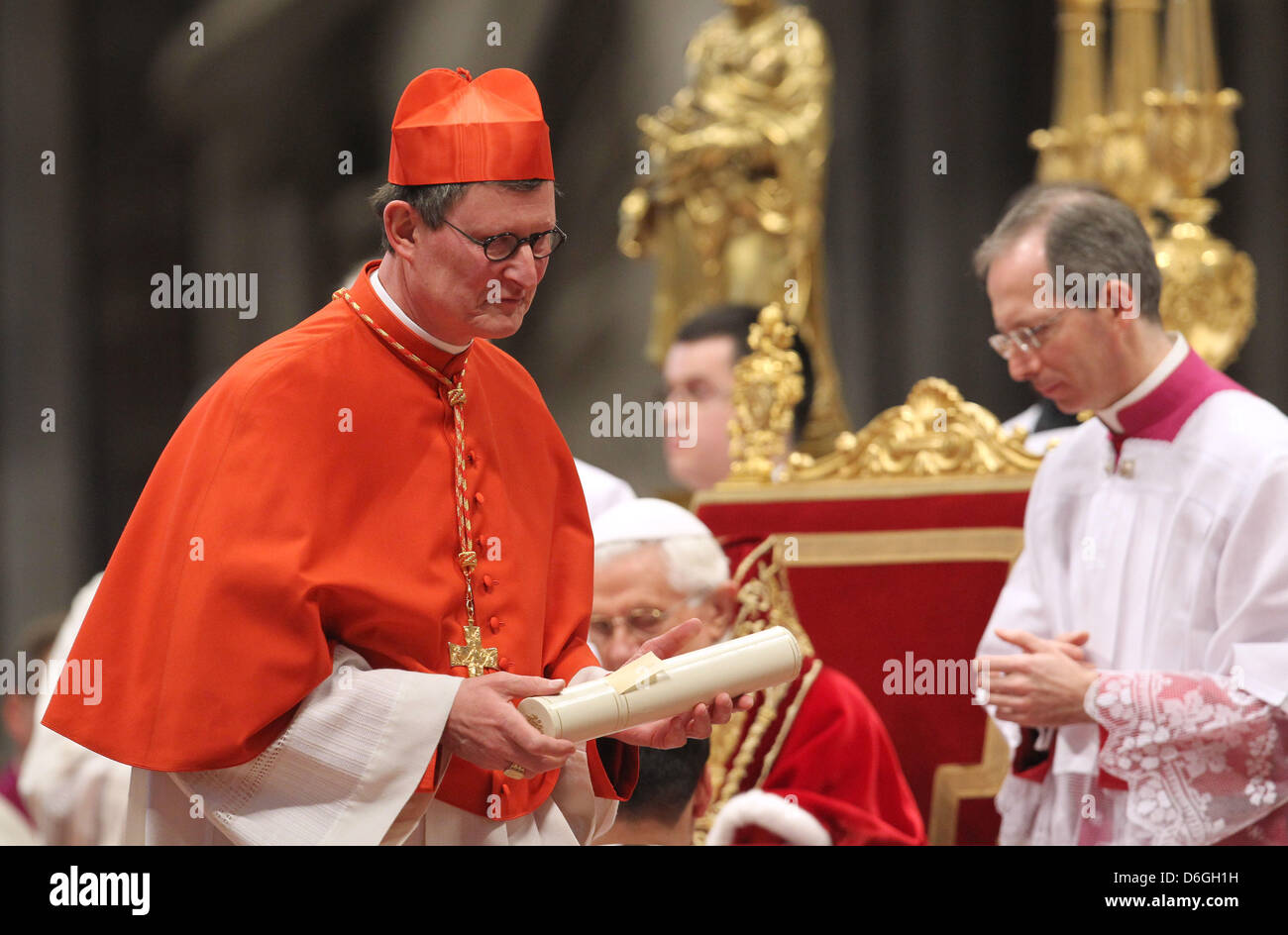 Berlin Archbishop Rainer Maria Woelki (L) receives his certificate of ...