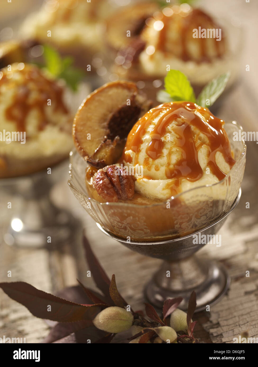 Peach Ice Cream with toffee sauce Stock Photo Alamy