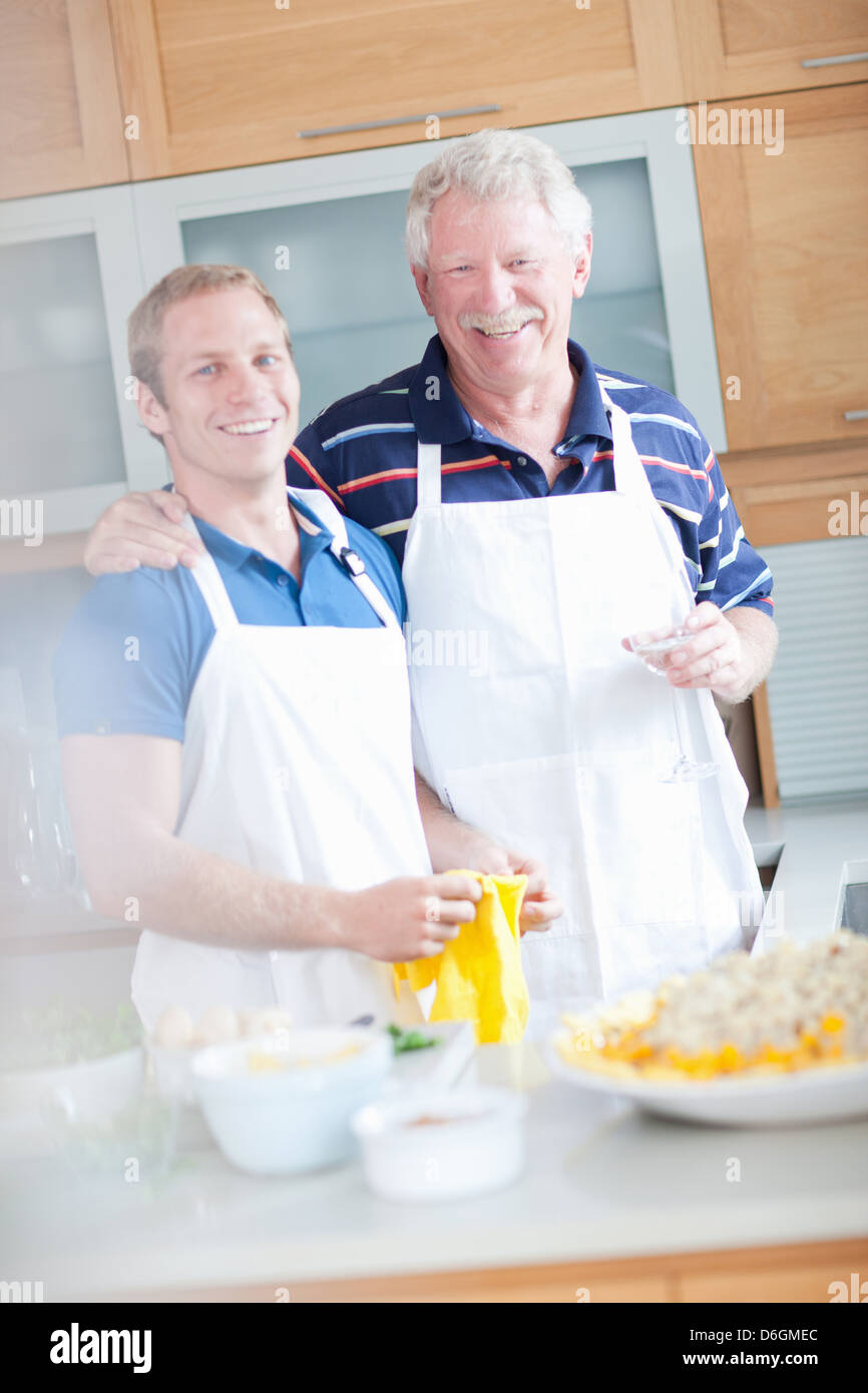 Father and son cooking in kitchen Stock Photo - Alamy