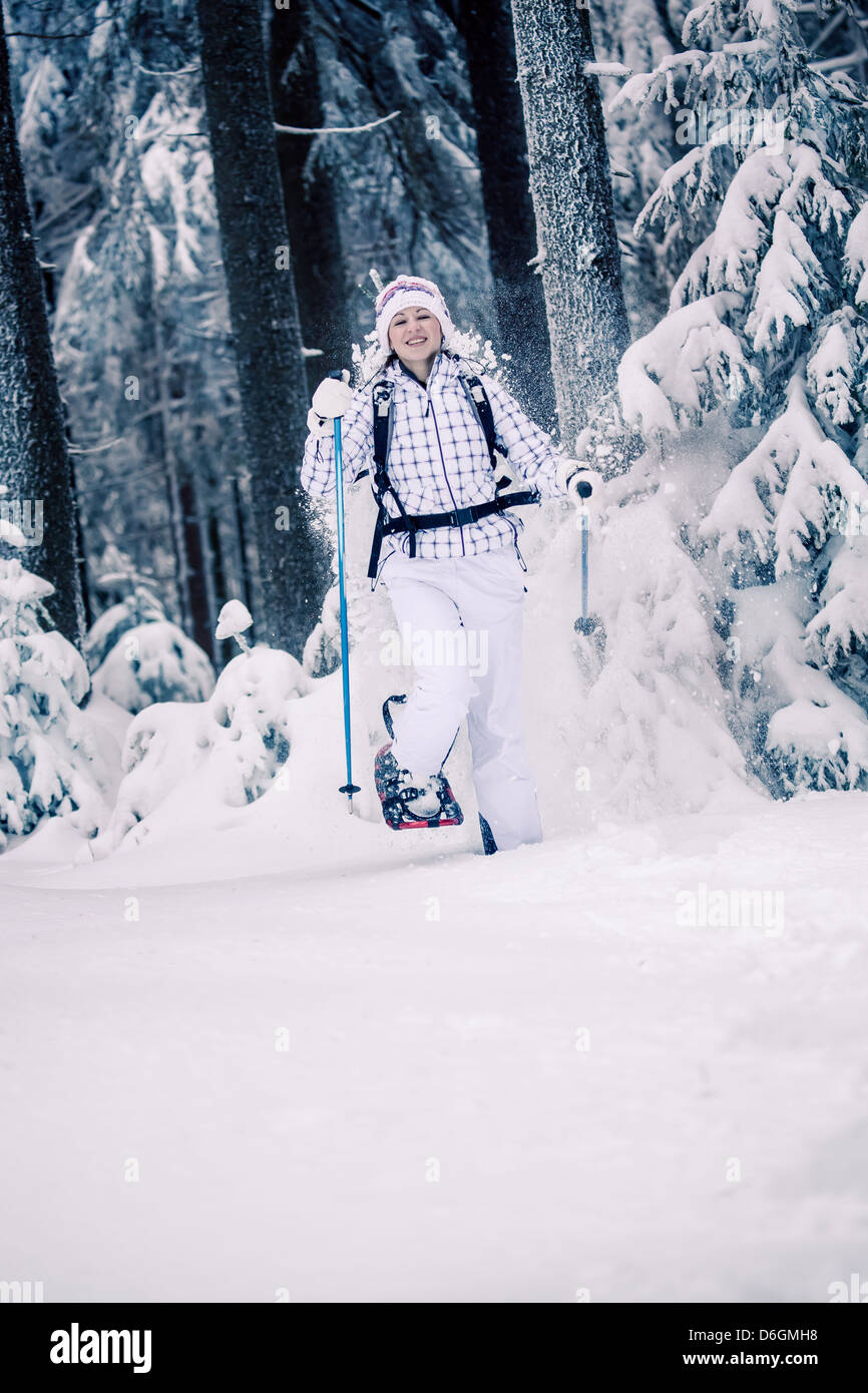 Hiking in snowy forest hi-res stock photography and images - Alamy
